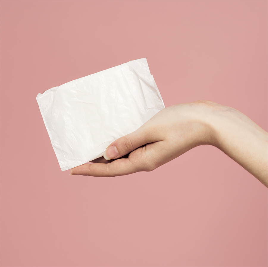 Hand holding sanitary pad